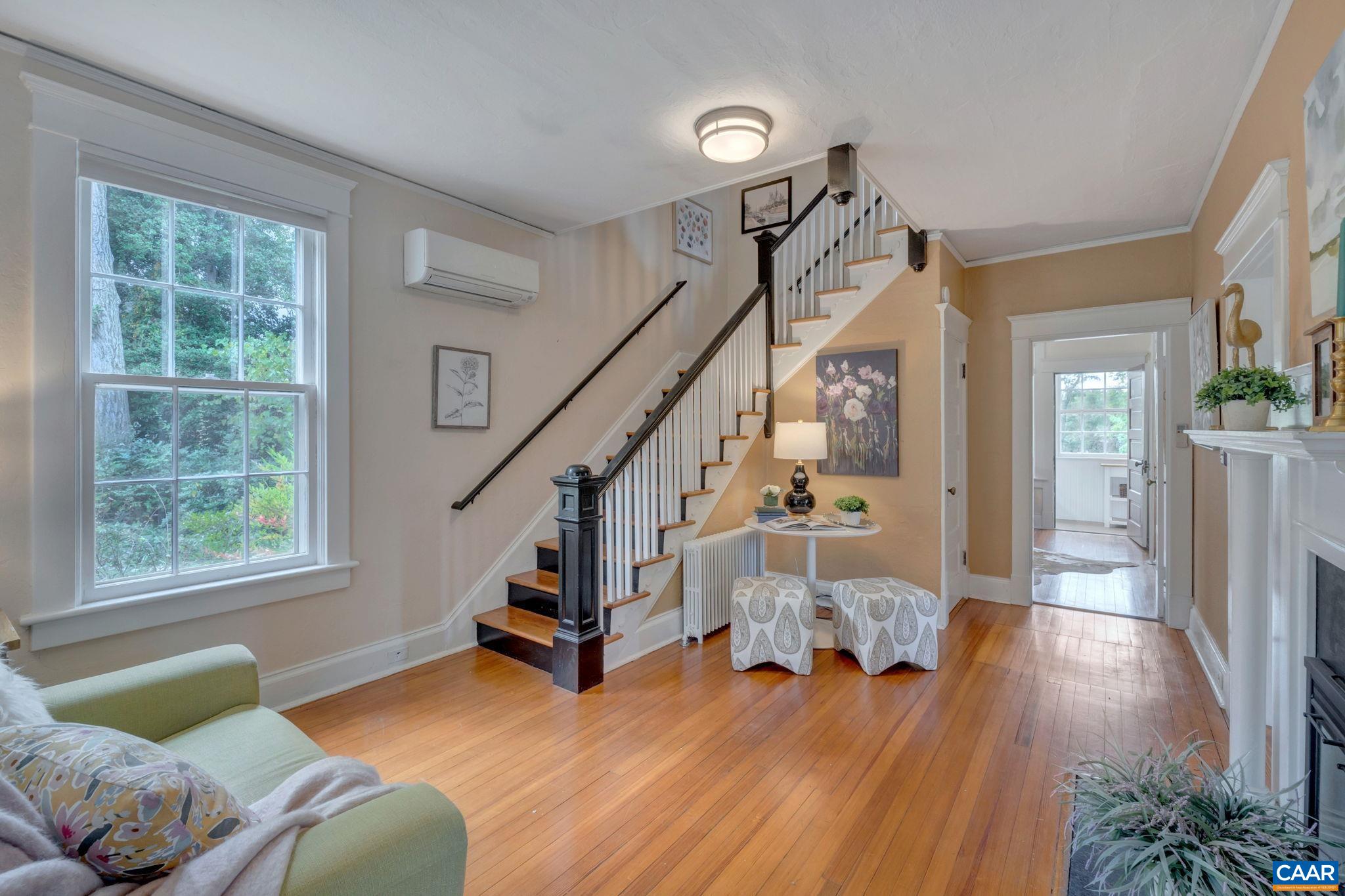 945 Locust Avenue Charlottesville, VA 22901 - Photo 6 of 52 a living room with furniture and a wooden floor