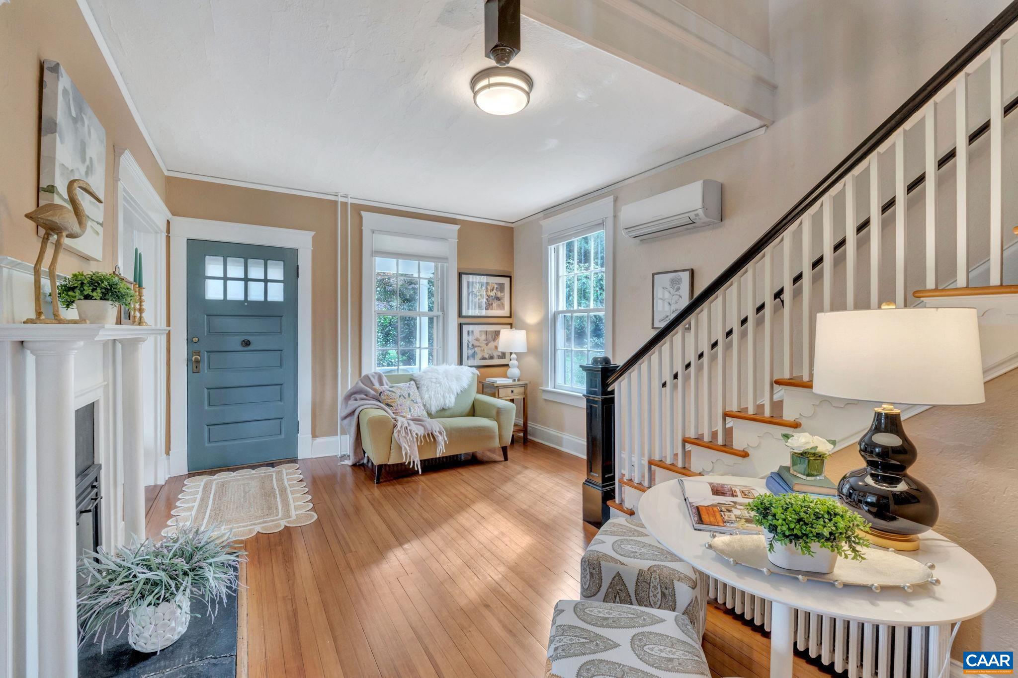 945 Locust Avenue Charlottesville, VA 22901 - Photo 7 of 52 a lobby with furniture and a potted plant