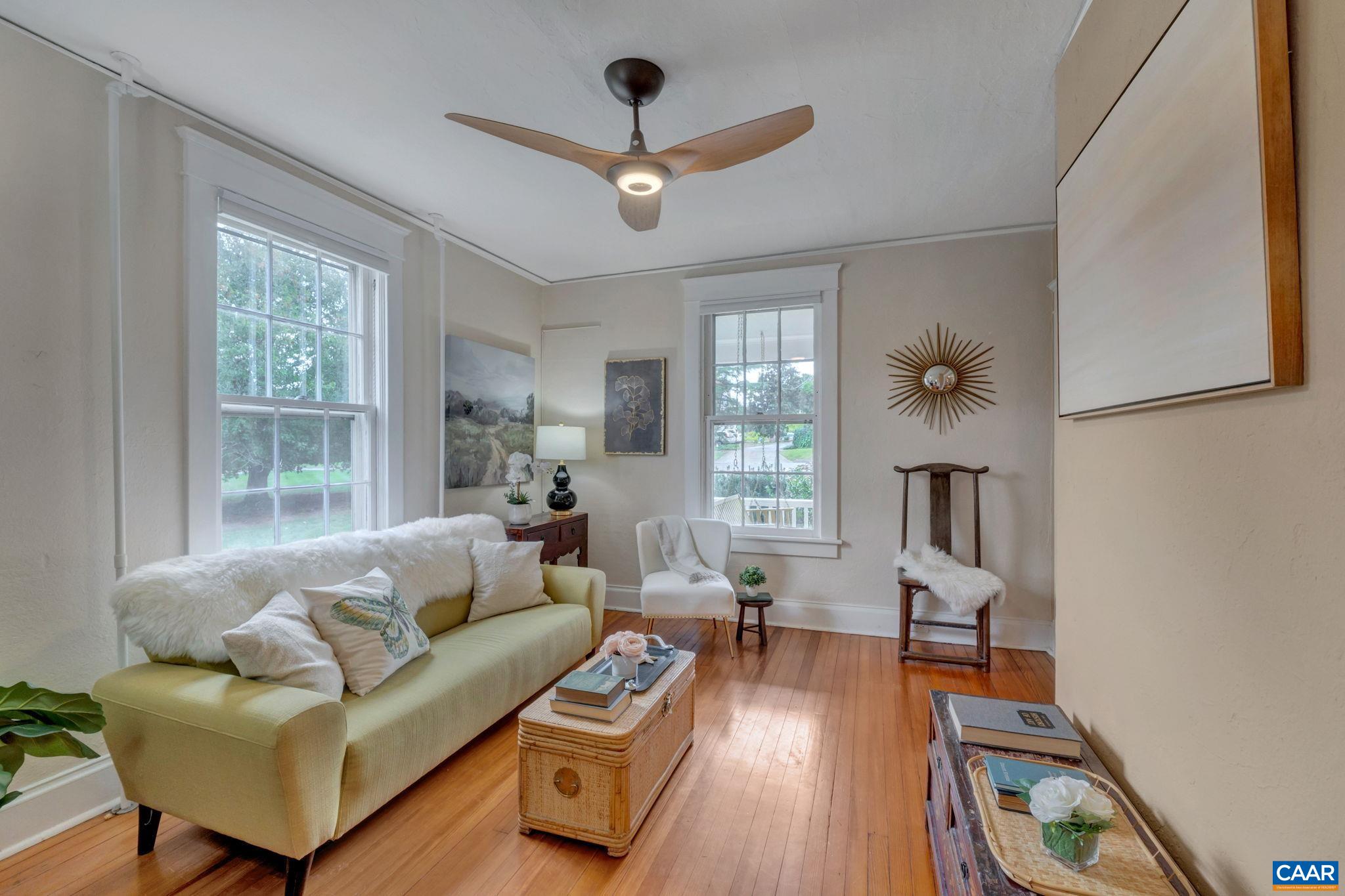 945 Locust Avenue Charlottesville, VA 22901 - Photo 10 of 52 a living room with furniture and a large window