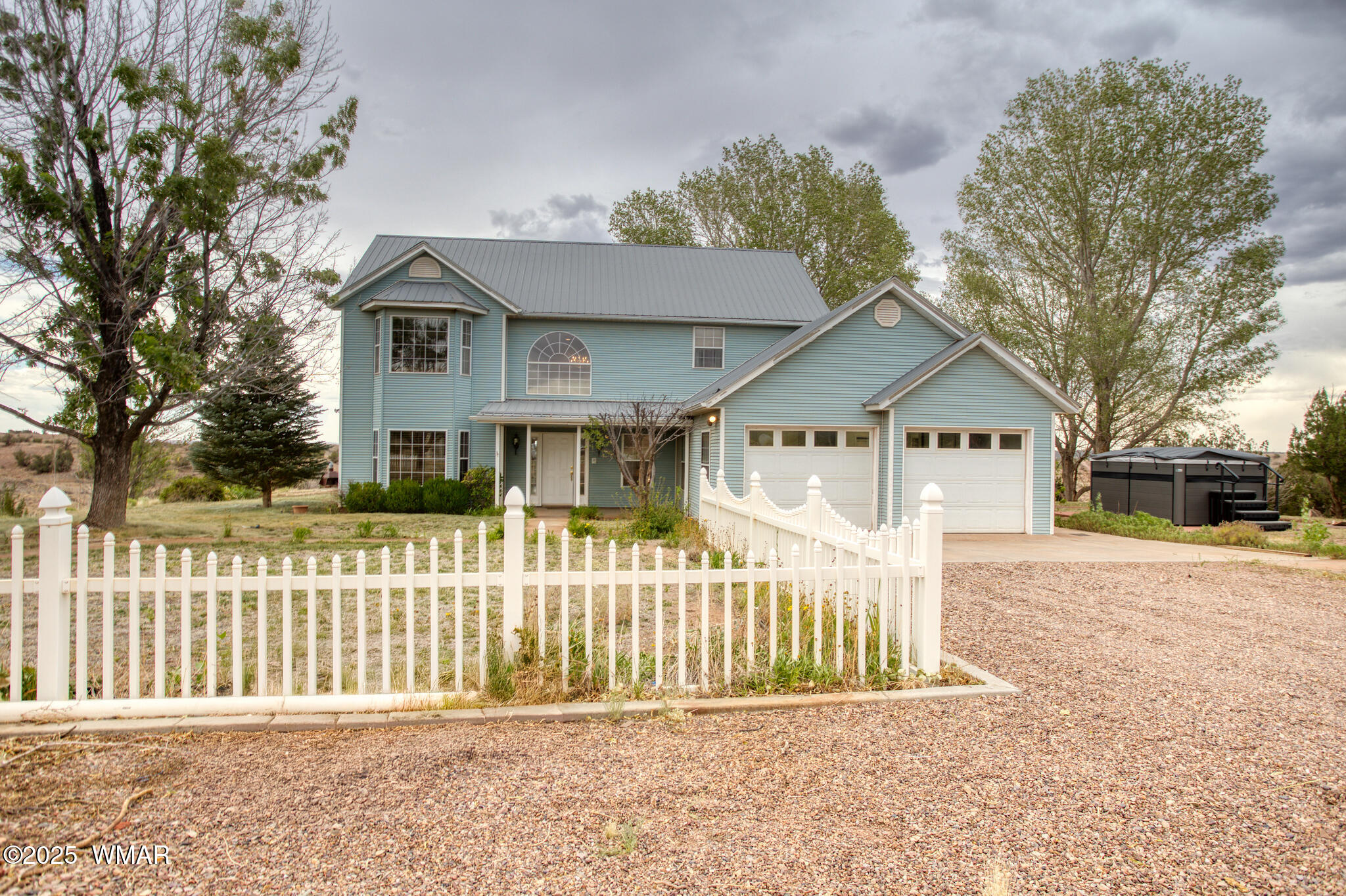 9410 Butler Trail Snowflake, AZ 85937 - Photo 1 of 62 a front view of a house with a yard