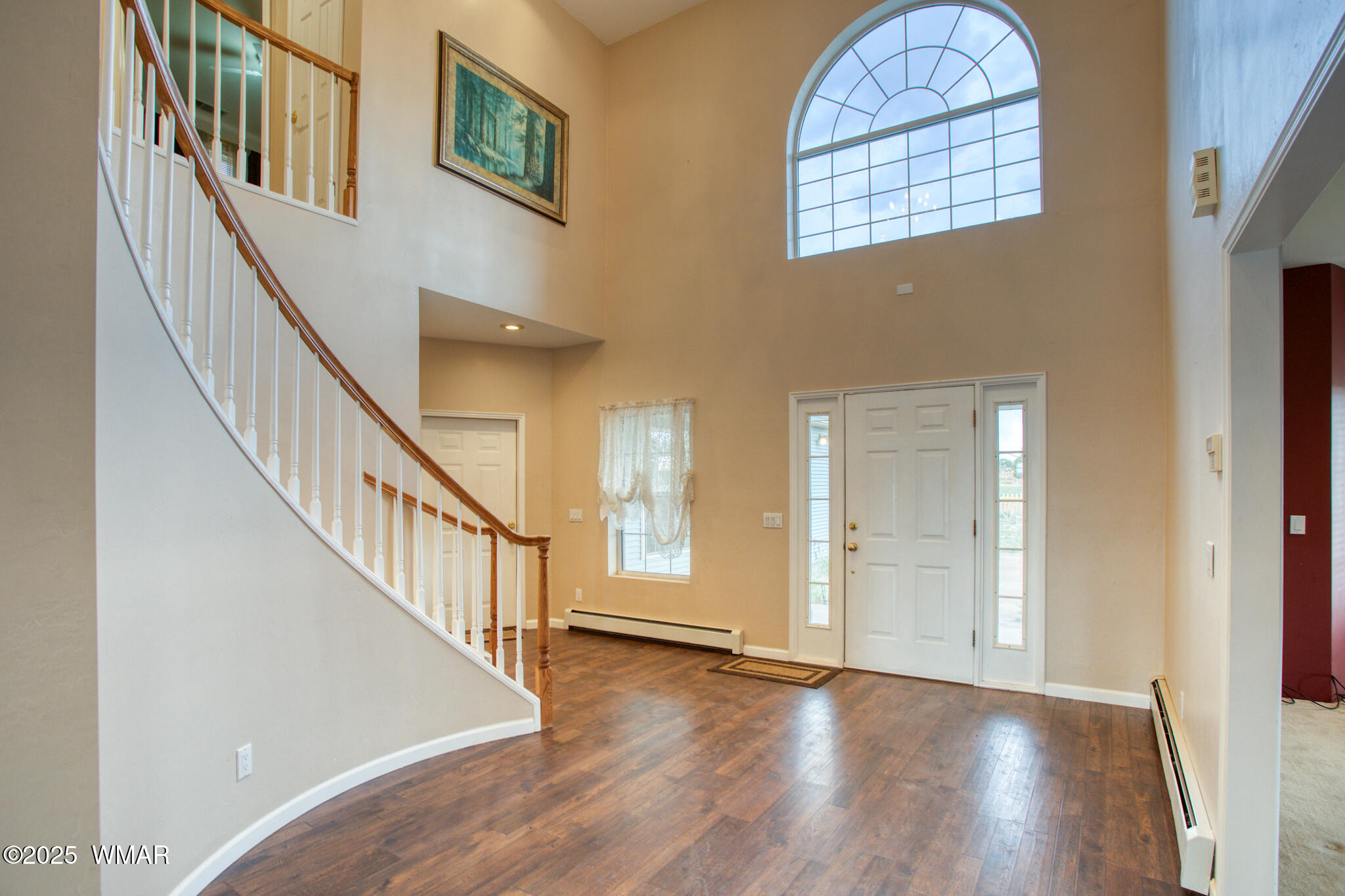 9410 Butler Trail Snowflake, AZ 85937 - Photo 21 of 62 a view of an entryway with wooden floor