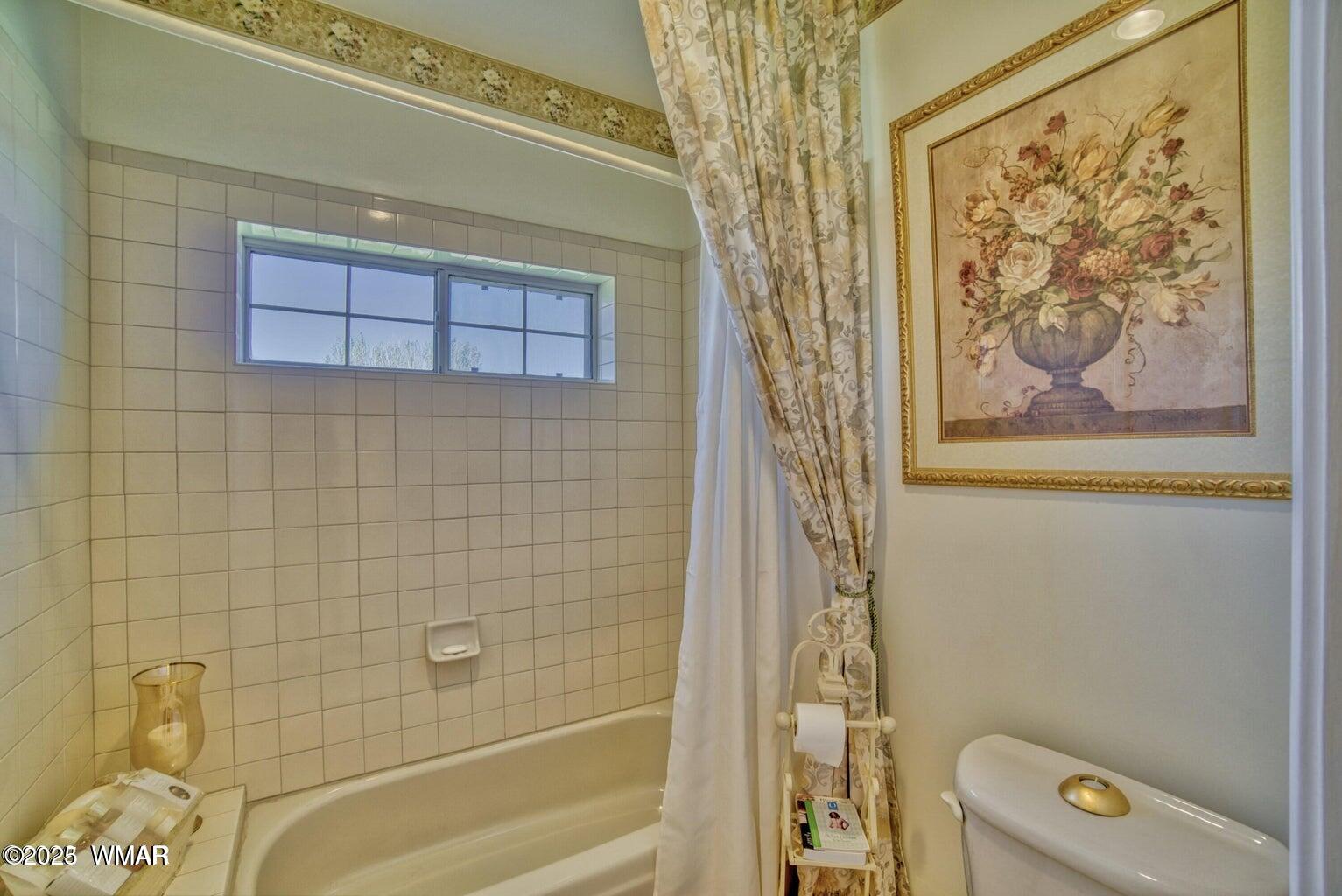 9410 Butler Trail Snowflake, AZ 85937 - Photo 41 of 62 a bathroom with a shower and a toilet