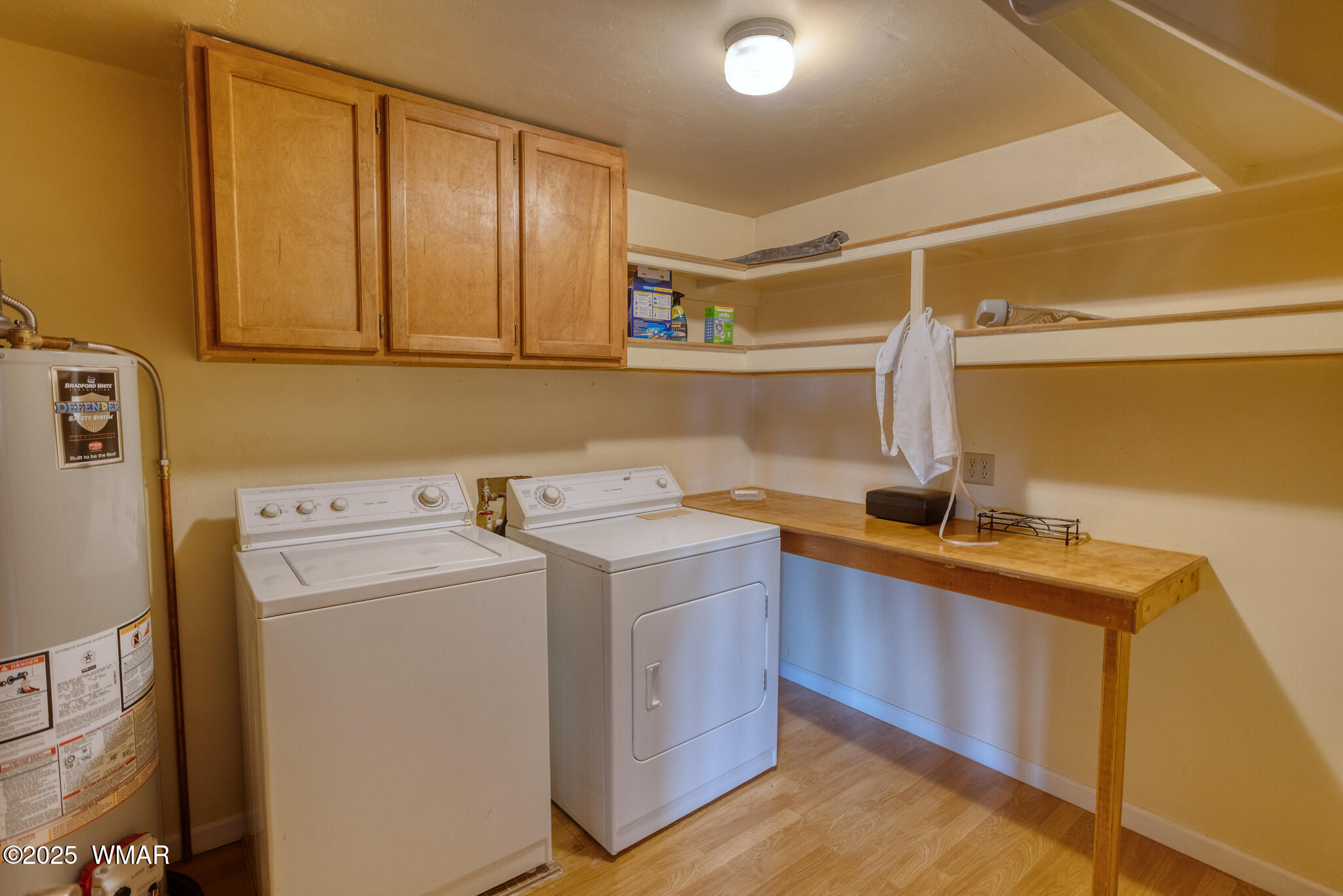 9410 Butler Trail Snowflake, AZ 85937 - Photo 42 of 62 a utility room with dryer and washer
