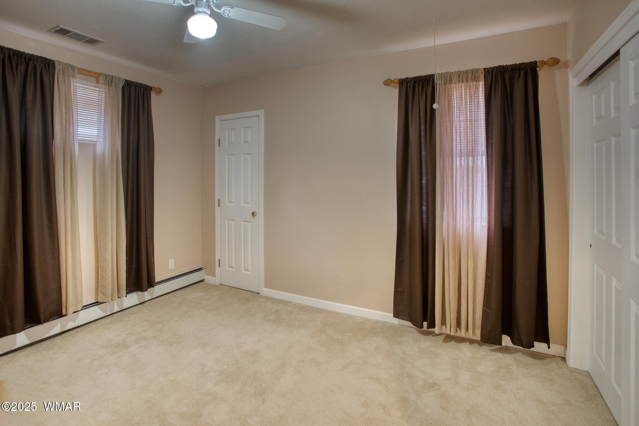 9410 Butler Trail Snowflake, AZ 85937 - Photo 49 of 62 an empty room with window and closet