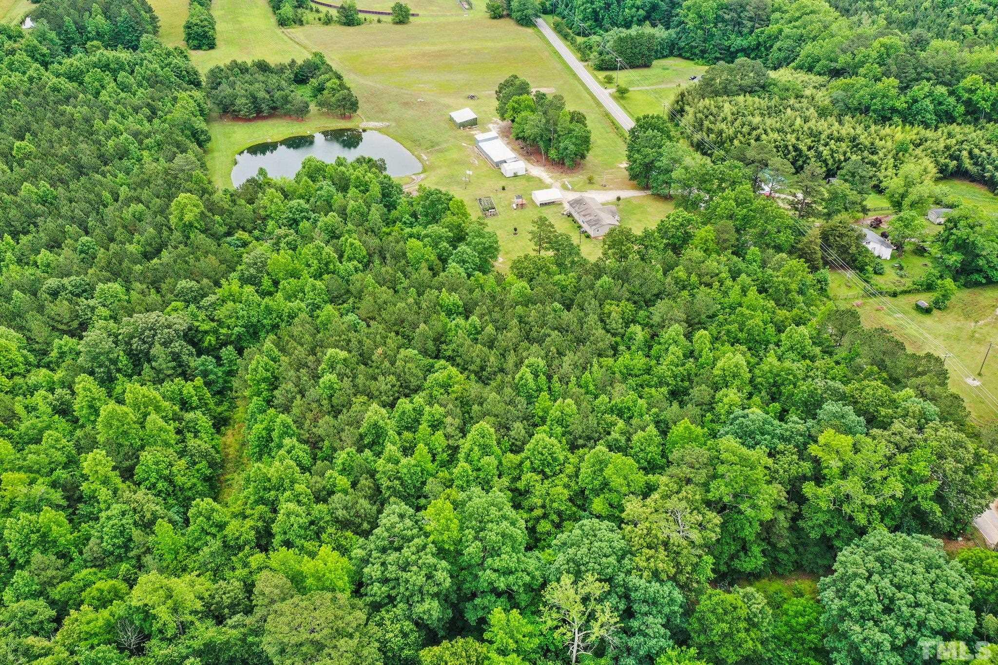 Lake Wendell Road Wendell, NC 27591 - Photo 4 of 6 an aerial view of residential houses with outdoor space and trees