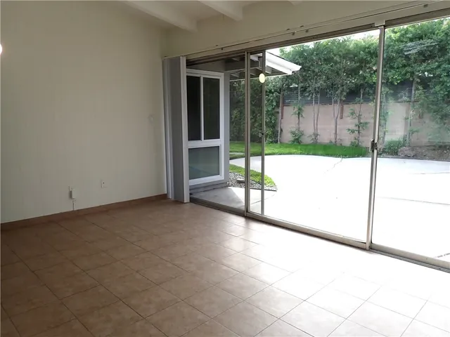 a view of backyard with green space