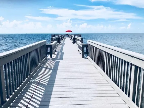 a view of balcony with furniture