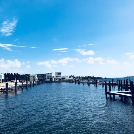 a view of a ocean with a nearby beach