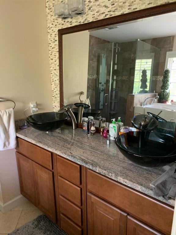 5160 Lakeview Parkway Villa Rica, GA 30180 - Photo 16 of 44 a room with sink and mirror