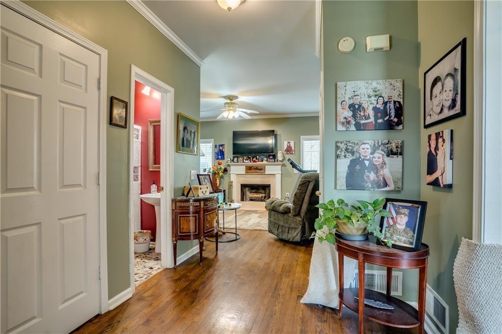 5160 Lakeview Parkway Villa Rica, GA 30180 - Photo 2 of 44 a living room with furniture and a flat screen tv