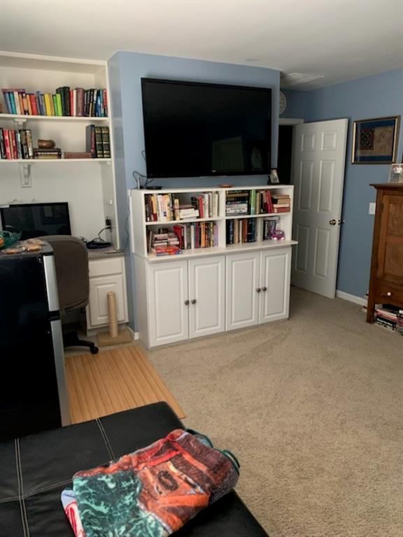 5160 Lakeview Parkway Villa Rica, GA 30180 - Photo 21 of 44 a living room with furniture and a flat screen tv