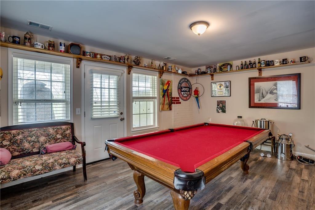 5160 Lakeview Parkway Villa Rica, GA 30180 - Photo 23 of 44 a room with pool table and windows