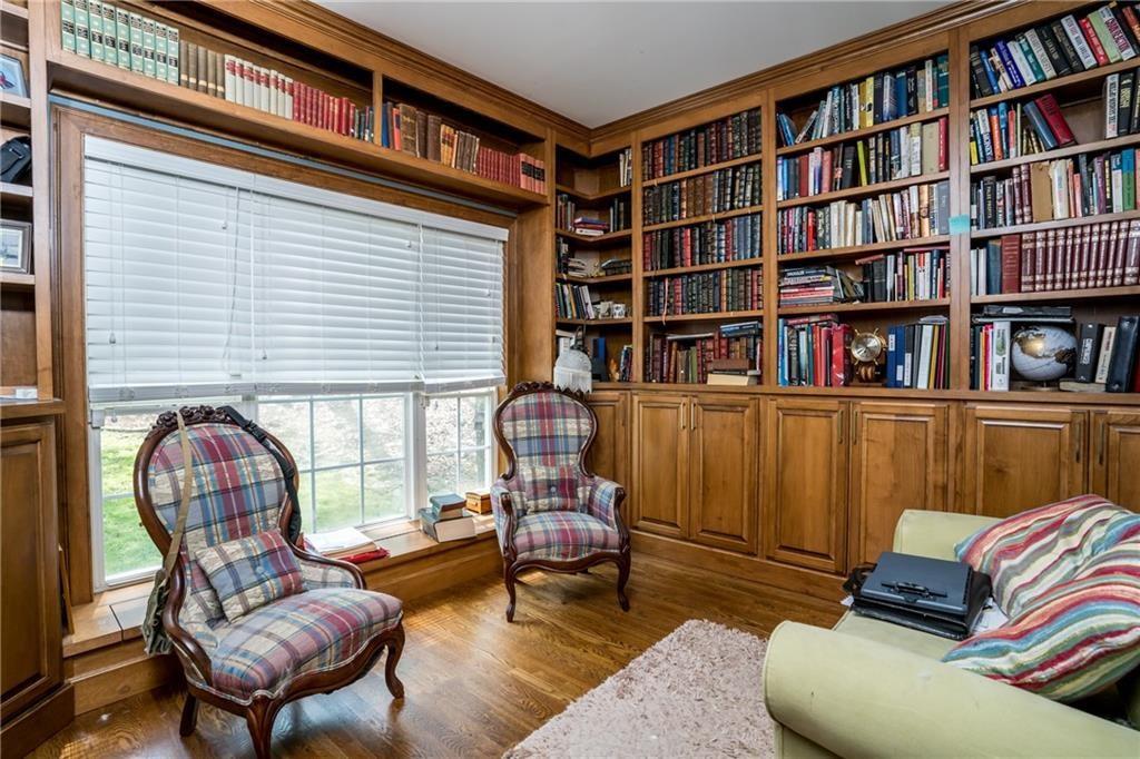 5160 Lakeview Parkway Villa Rica, GA 30180 - Photo 3 of 44 a living room with furniture and a book shelf