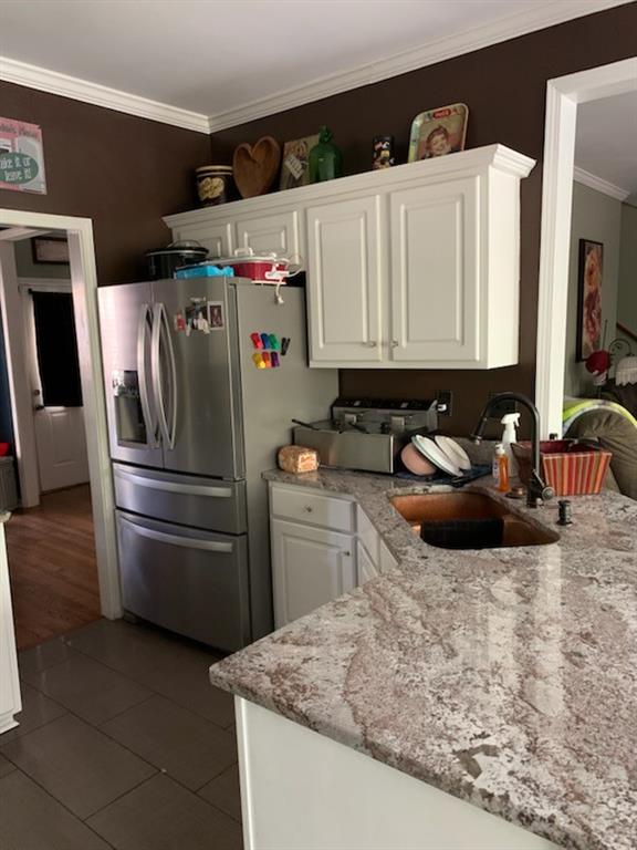 5160 Lakeview Parkway Villa Rica, GA 30180 - Photo 7 of 44 a kitchen with refrigerator and stove