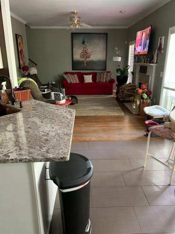 5160 Lakeview Parkway Villa Rica, GA 30180 - Photo 9 of 44 a living room with furniture a flat screen tv and a fireplace