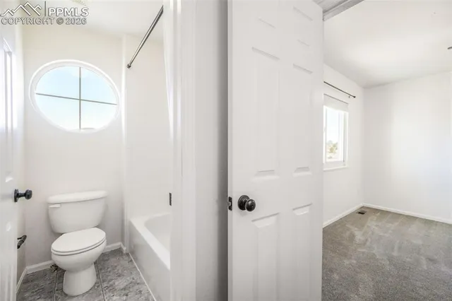 a bathroom with a sink double vanity and a mirror