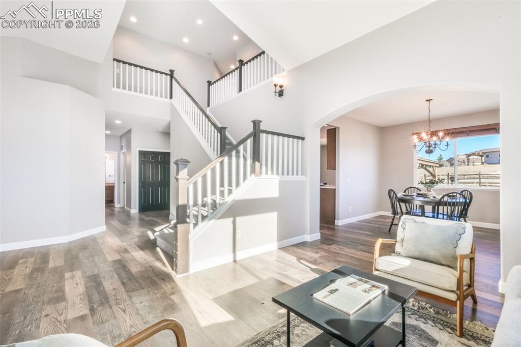 1675 Bowstring Road Monument, CO 80132 - Photo 9 of 50 a living room with furniture and a table
