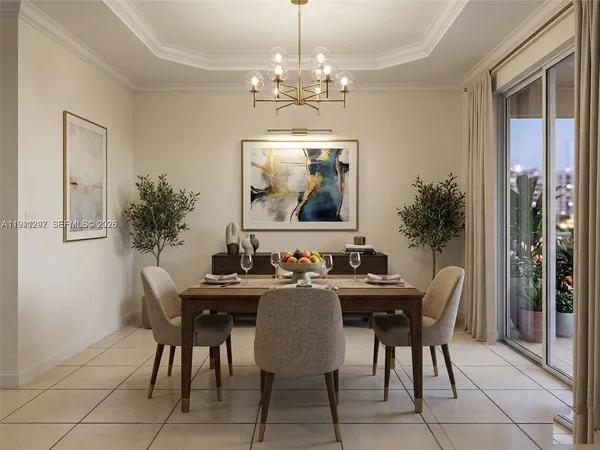 a view of a dining room with furniture and chandelier