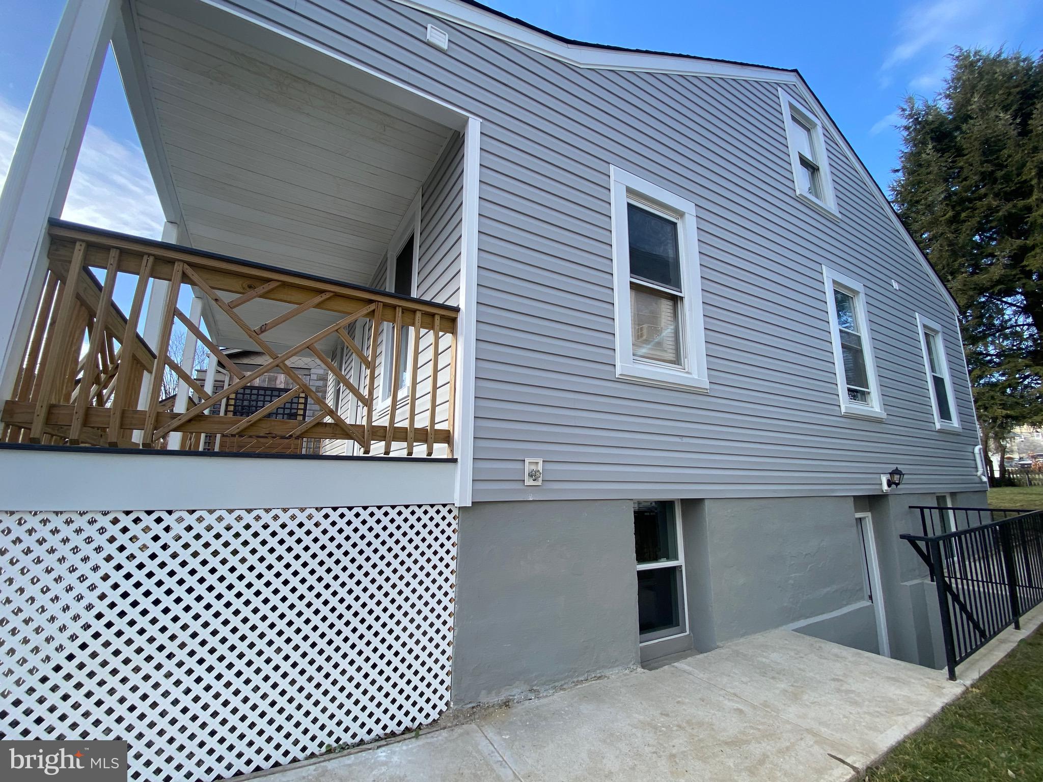 4027 Ridgecroft Road Baltimore, MD 21206 - Photo 34 of 44 Side view and basement entrance
