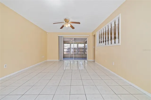 a view of an empty room and window