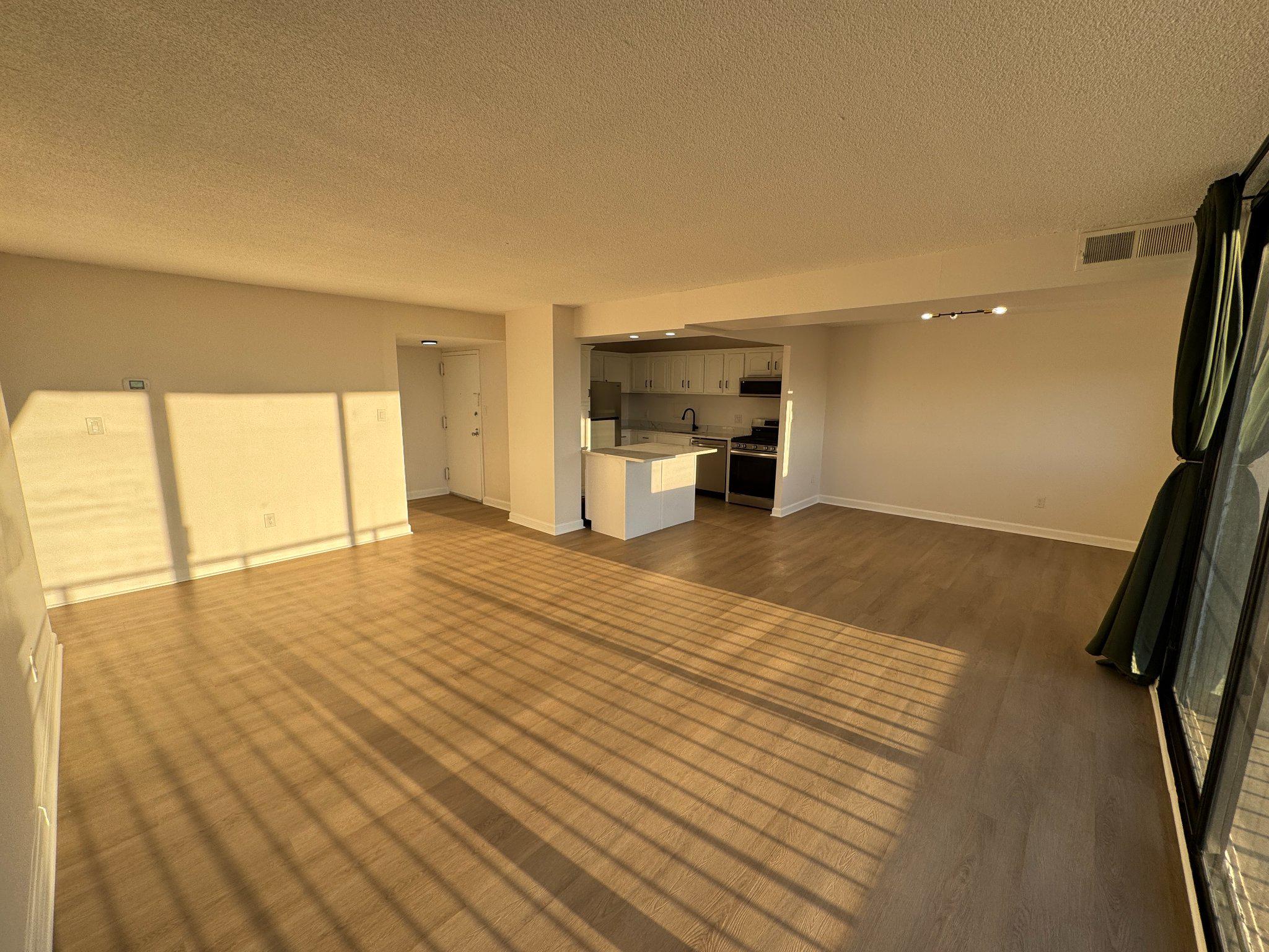 1836 Metzerott Road, Unit 1722 Hyattsville, MD 20783 - Photo 2 of 17 Open living and dining area, veiw 1.