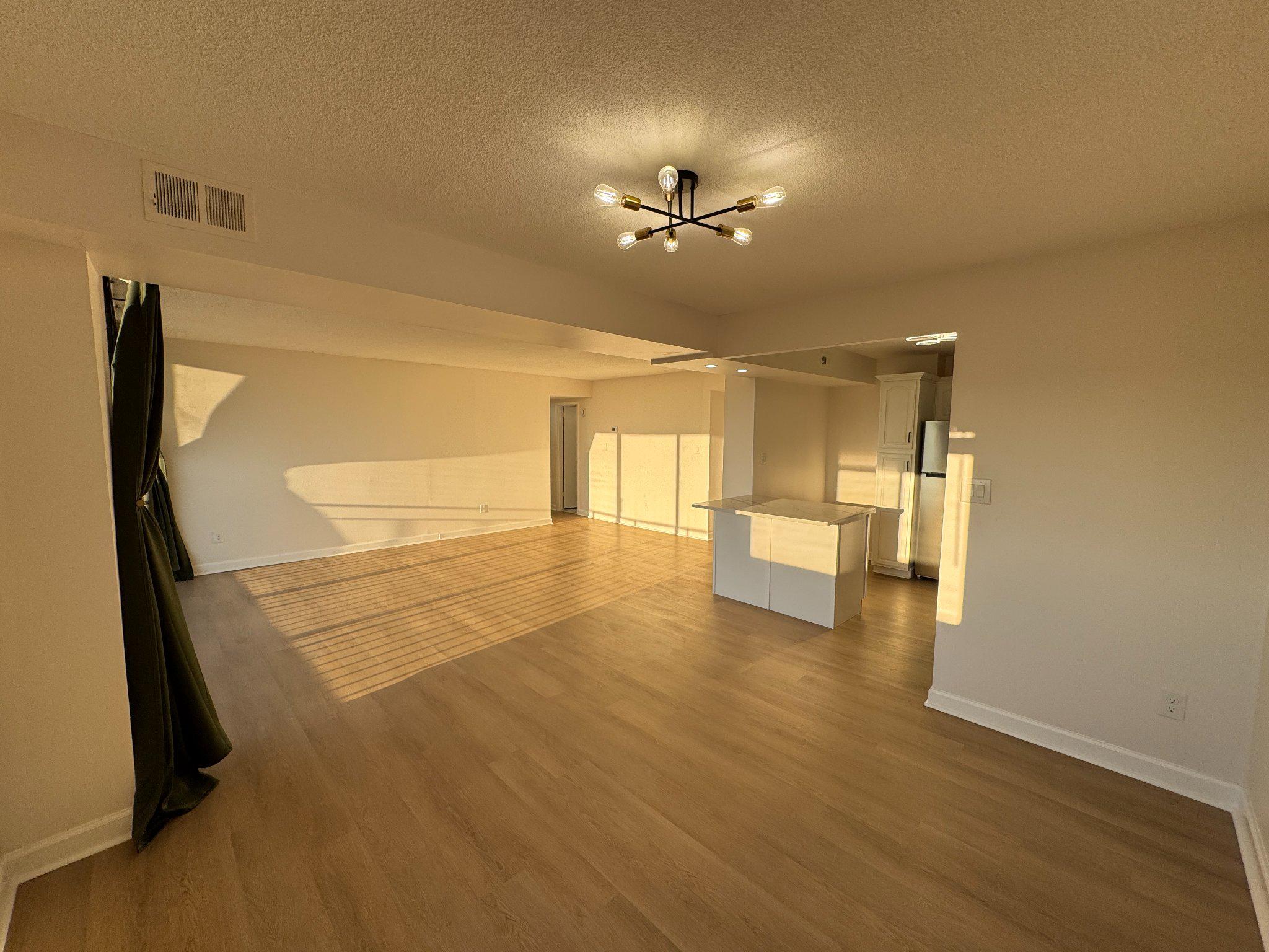 1836 Metzerott Road, Unit 1722 Hyattsville, MD 20783 - Photo 4 of 17 Open living and dining area, veiw 3.