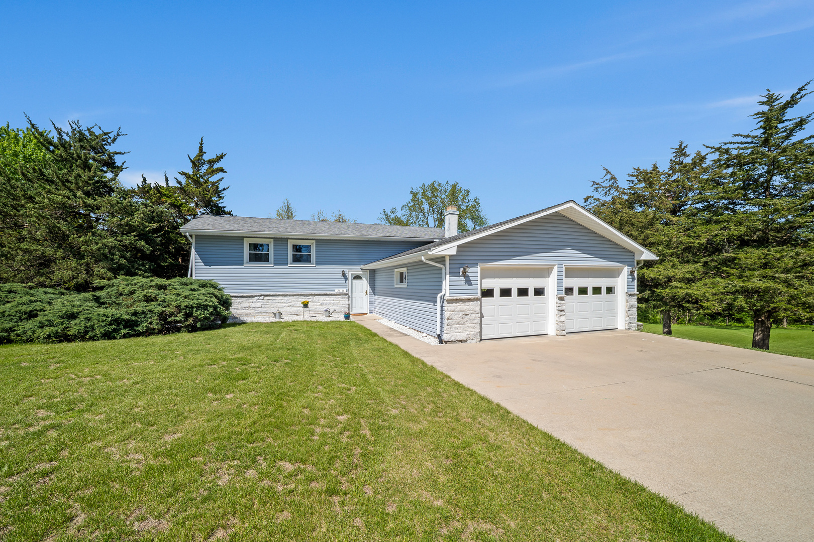 24146 Stage Coach Road Geneseo, IL 61254 - Photo 1 of 39 front view of a house with a yard