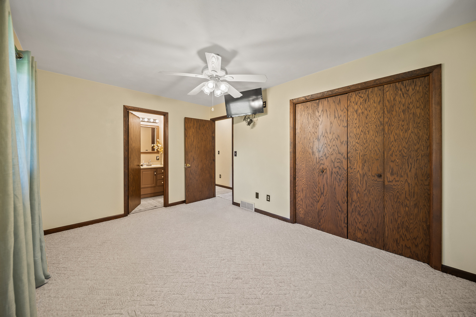 24146 Stage Coach Road Geneseo, IL 61254 - Photo 18 of 39 a view of a room with a chandelier fan and closet area