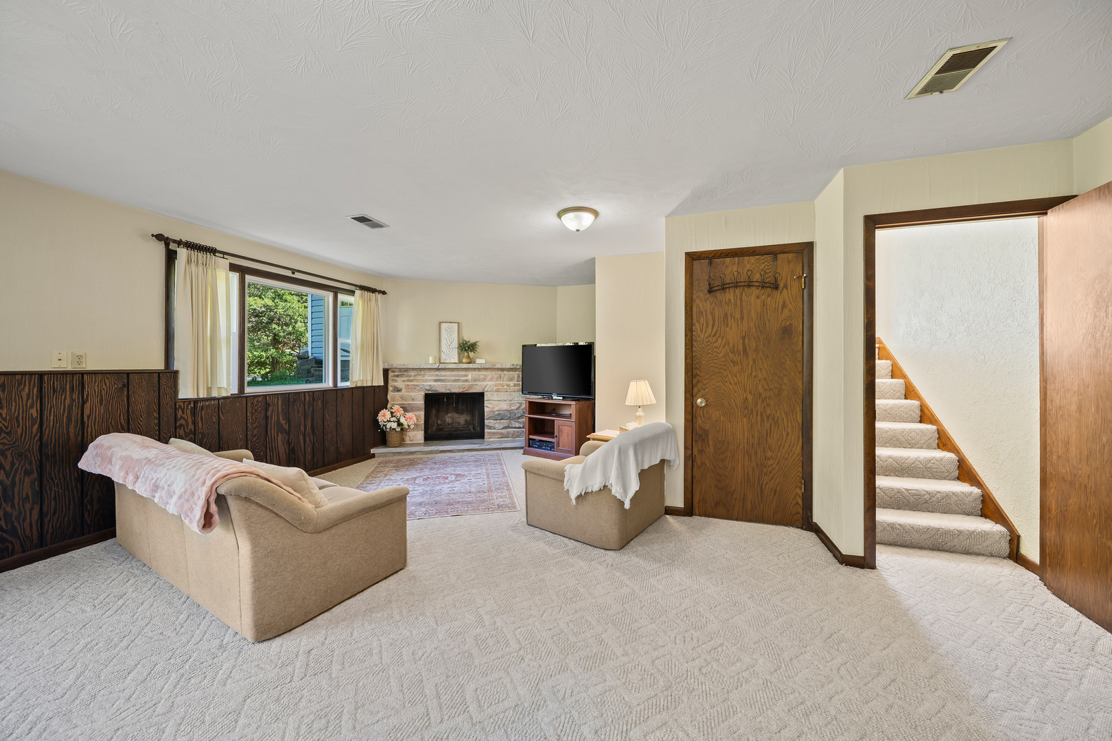 24146 Stage Coach Road Geneseo, IL 61254 - Photo 20 of 39 a living room with furniture and a fireplace