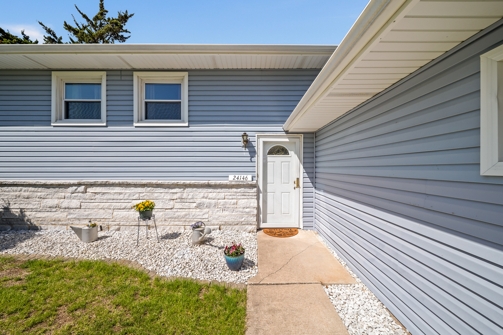 24146 Stage Coach Road Geneseo, IL 61254 - Photo 2 of 39 a view of a back yard of the house
