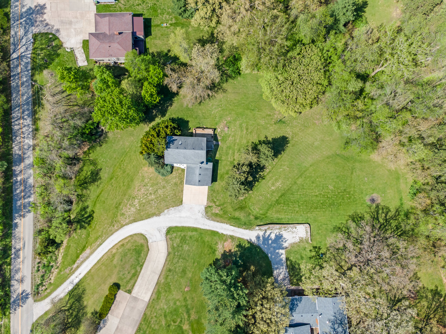 24146 Stage Coach Road Geneseo, IL 61254 - Photo 35 of 39 an aerial view of a house with a yard and lake view