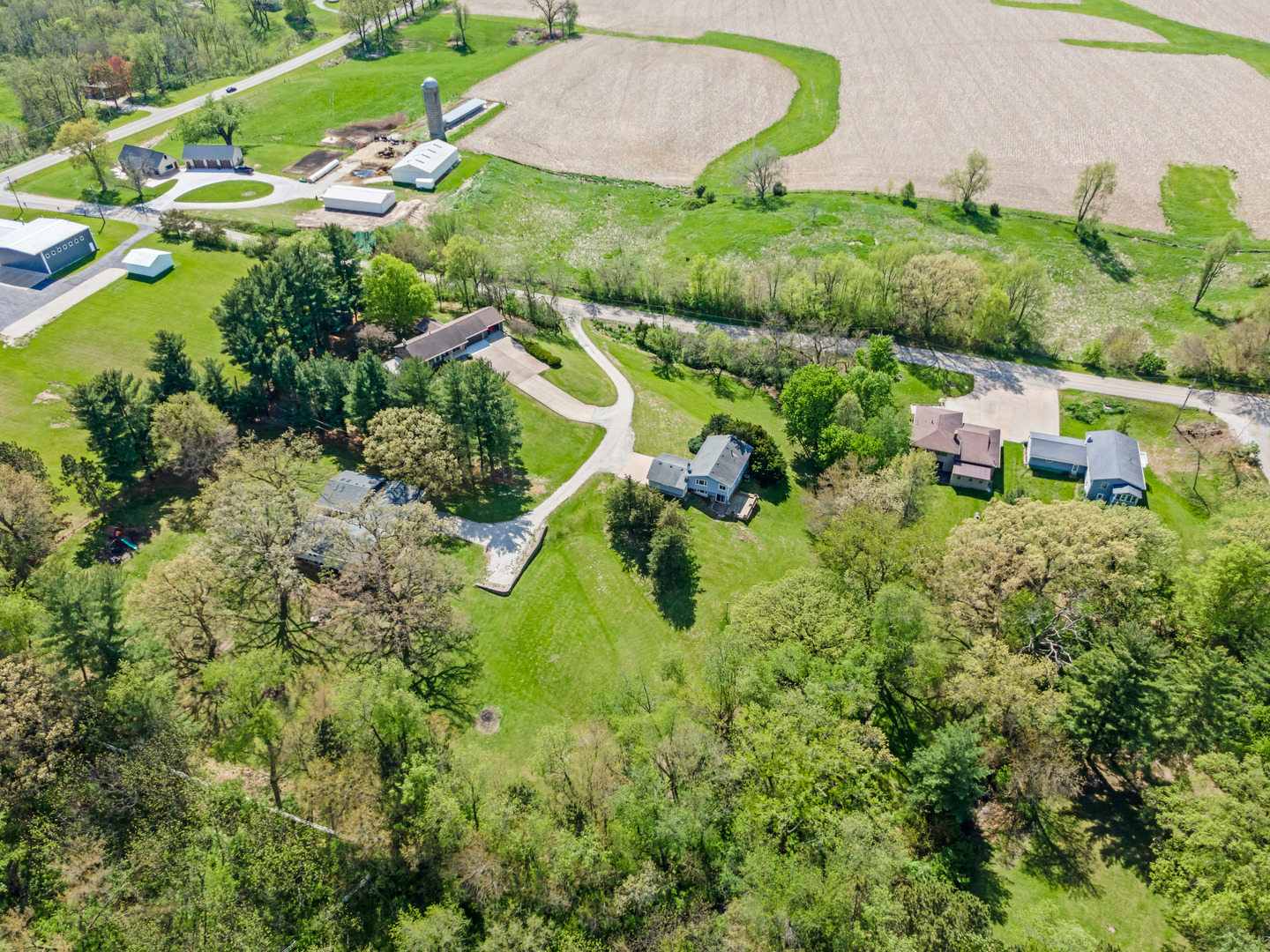 24146 Stage Coach Road Geneseo, IL 61254 - Photo 36 of 39 an aerial view of a house with a garden and swimming pool