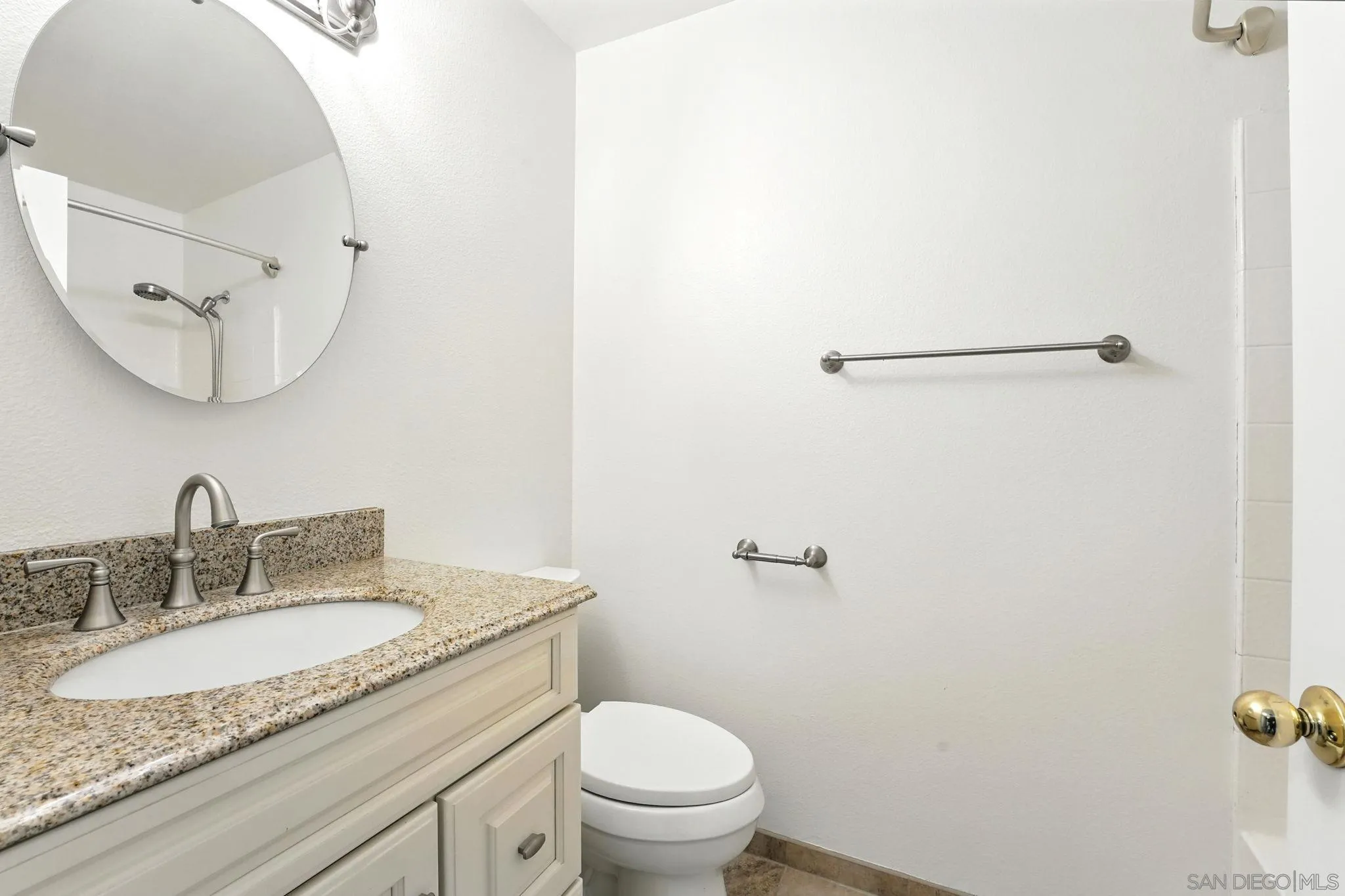 29581 Cara Way Temecula, CA 92591 - Photo 19 of 24 a bathroom with a granite countertop sink mirror vanity and toilet
