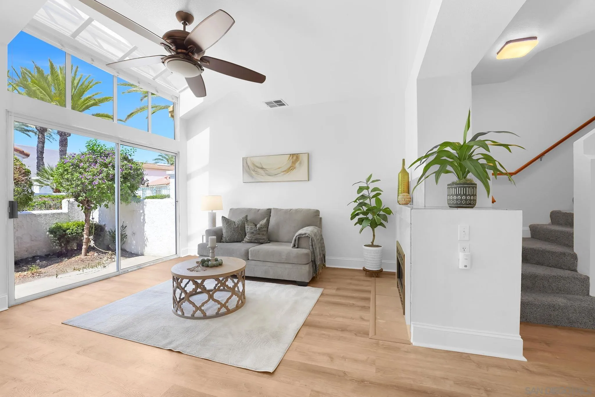 29581 Cara Way Temecula, CA 92591 - Photo 2 of 24 a living room with furniture potted plant and a large window