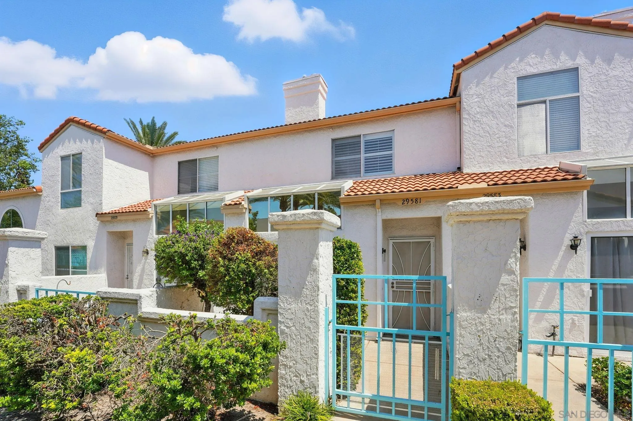 29581 Cara Way Temecula, CA 92591 - Photo 24 of 24 a front view of a house with a yard