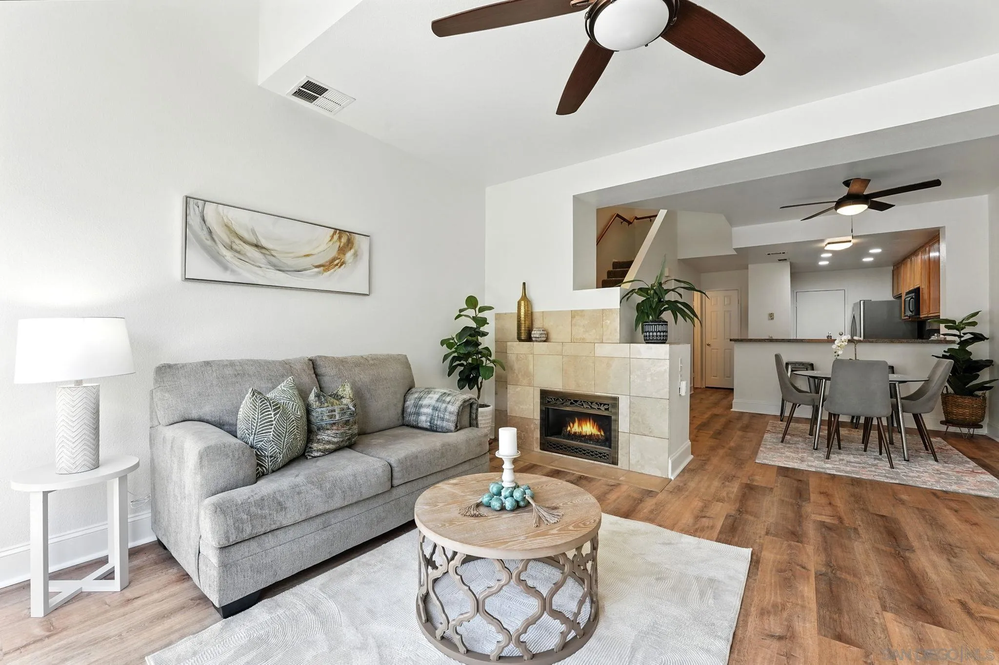 29581 Cara Way Temecula, CA 92591 - Photo 3 of 24 a living room with furniture and a fireplace