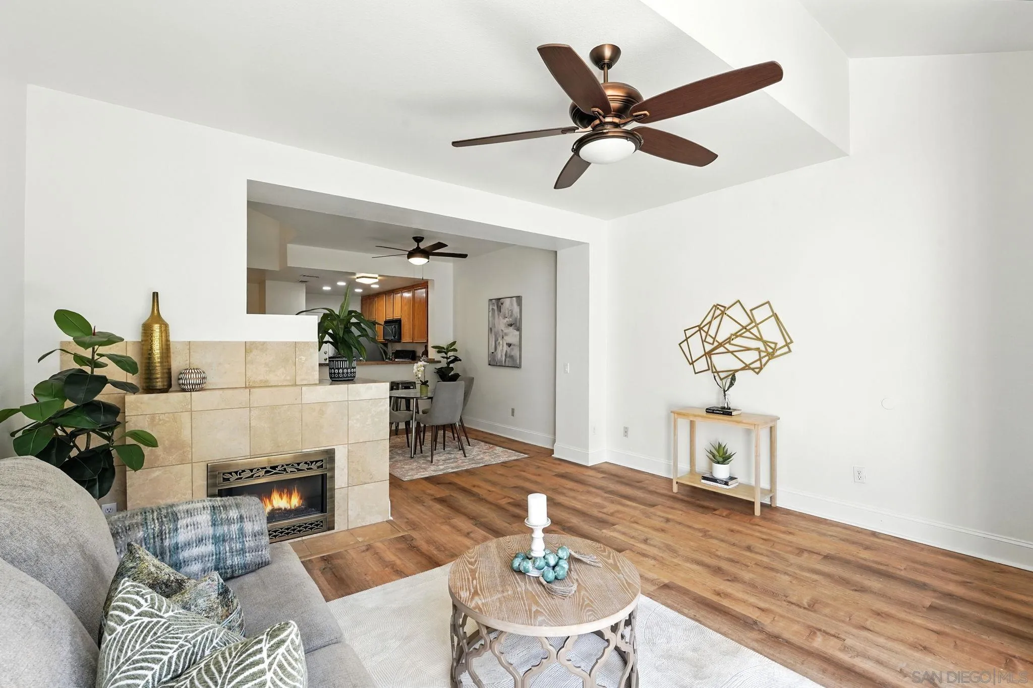 29581 Cara Way Temecula, CA 92591 - Photo 4 of 24 a living room with furniture a fireplace and a window