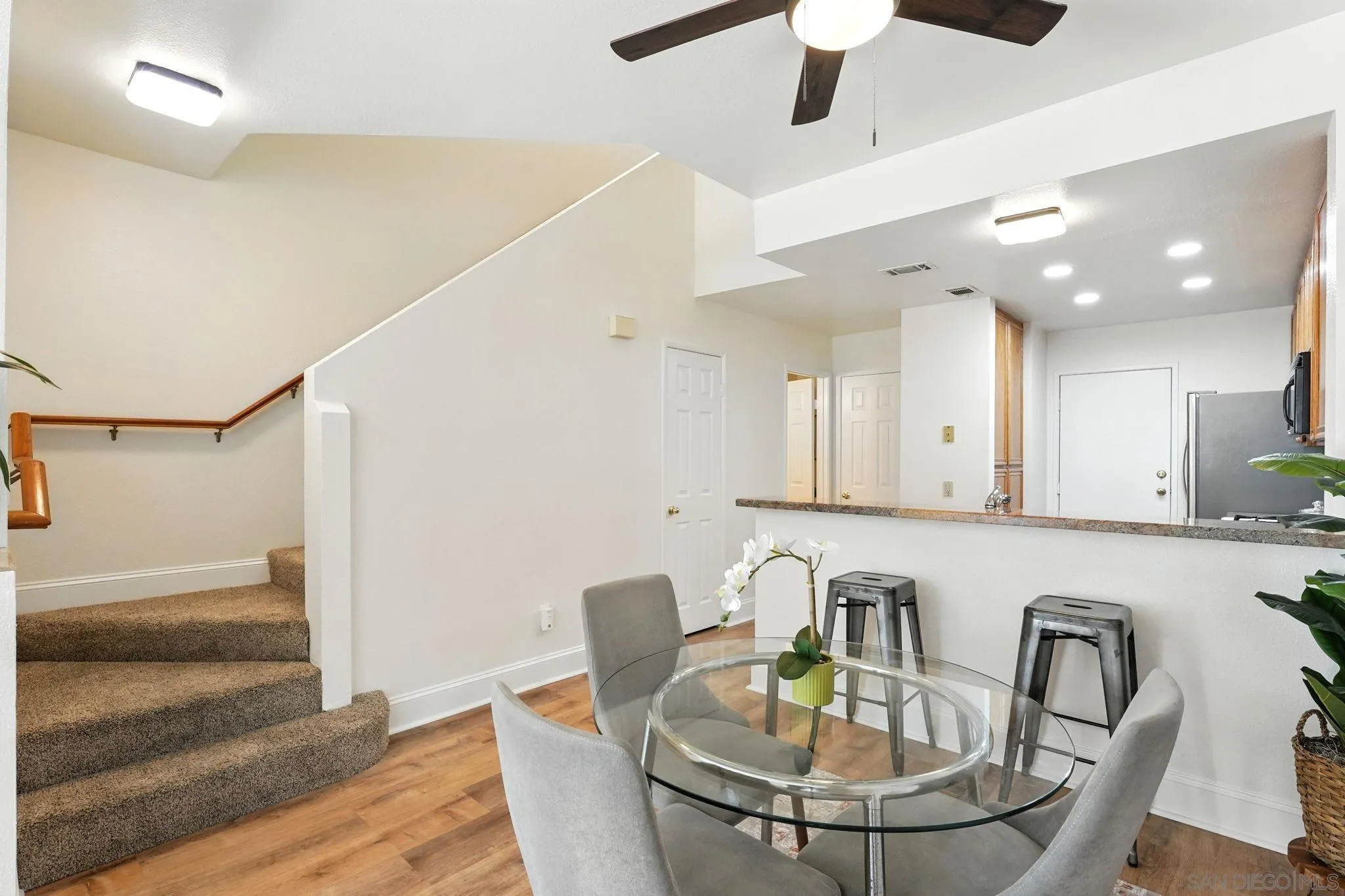 29581 Cara Way Temecula, CA 92591 - Photo 5 of 24 a kitchen with furniture and a sink