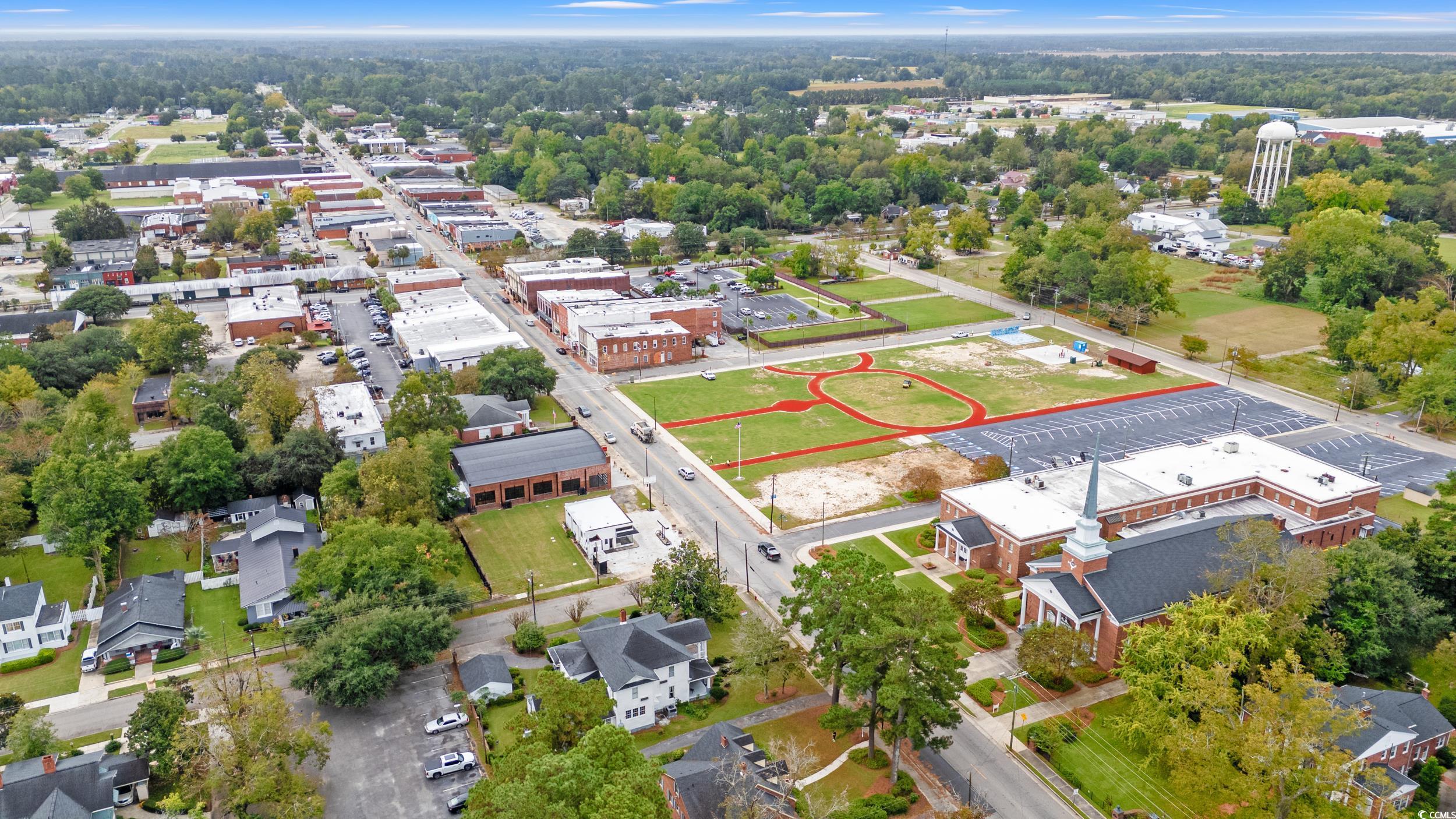 310 North Main Street Mullins, SC 29574 - Photo 7 of 35 Bird's eye view of a tree filled landscape