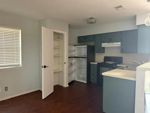 a room with storage and utility