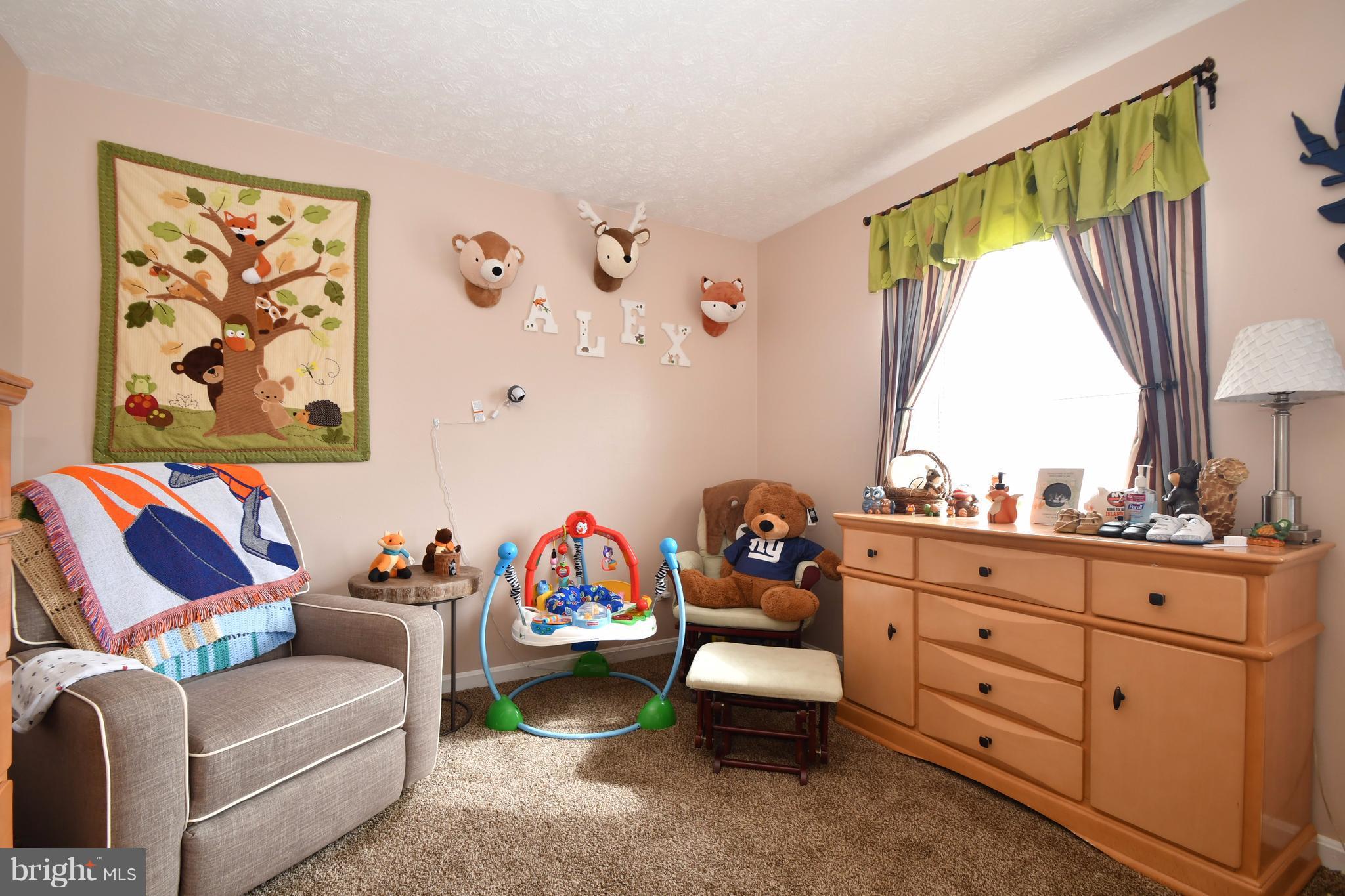 3924 Cutty Sark Road Baltimore, MD 21220 - Photo 20 of 30 a living room with furniture and a large window