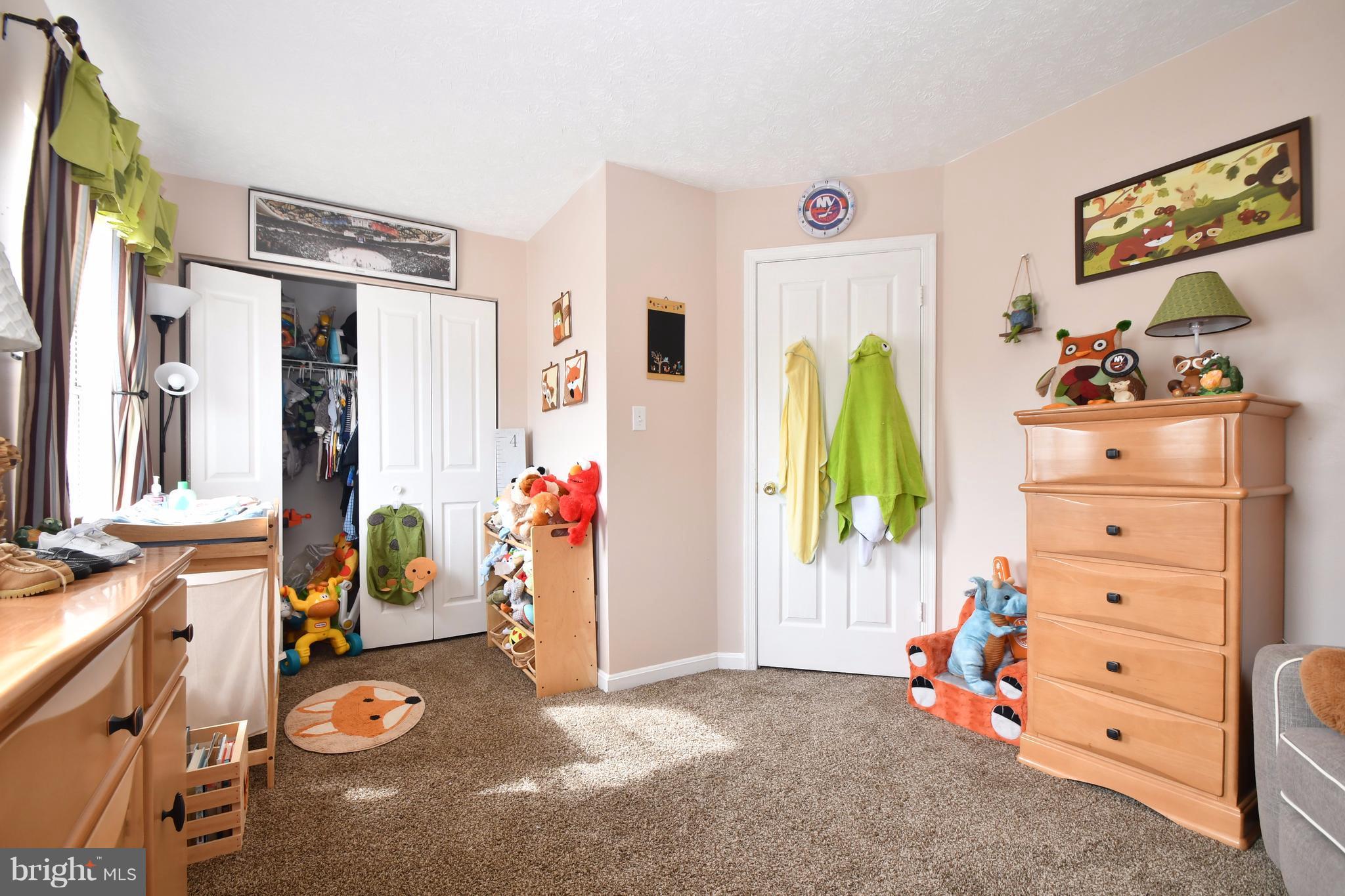 3924 Cutty Sark Road Baltimore, MD 21220 - Photo 21 of 30 a bedroom with a bed and a window