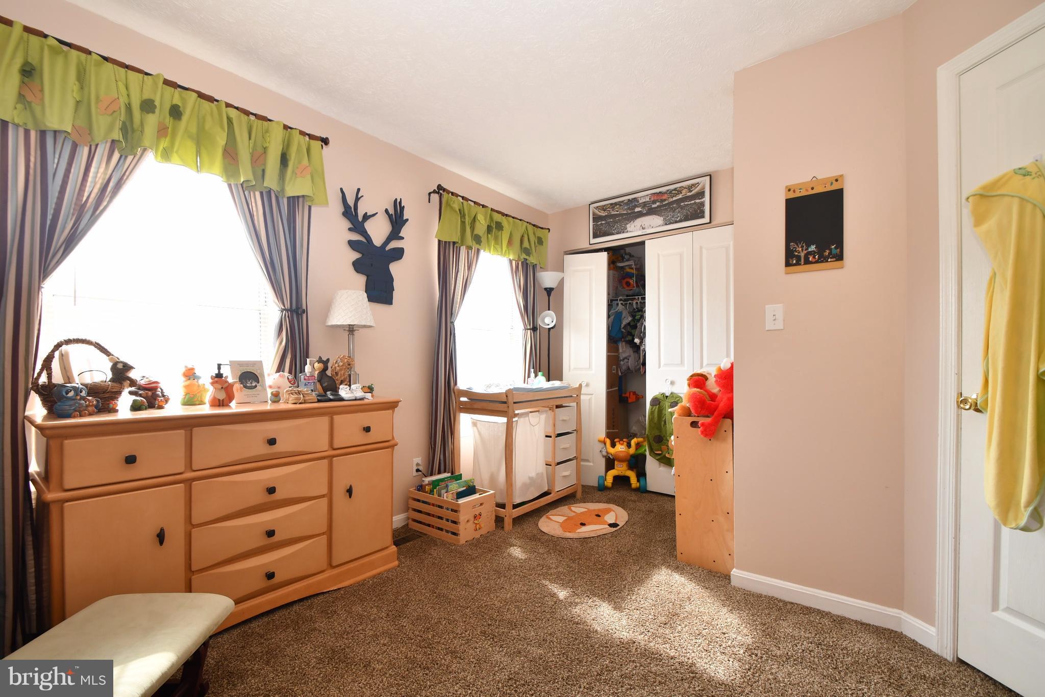 3924 Cutty Sark Road Baltimore, MD 21220 - Photo 22 of 30 a bed room with a bed and a window