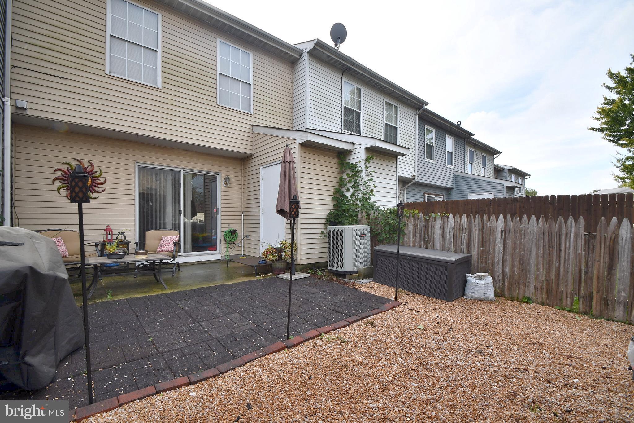 3924 Cutty Sark Road Baltimore, MD 21220 - Photo 24 of 30 a front view of a house with patio