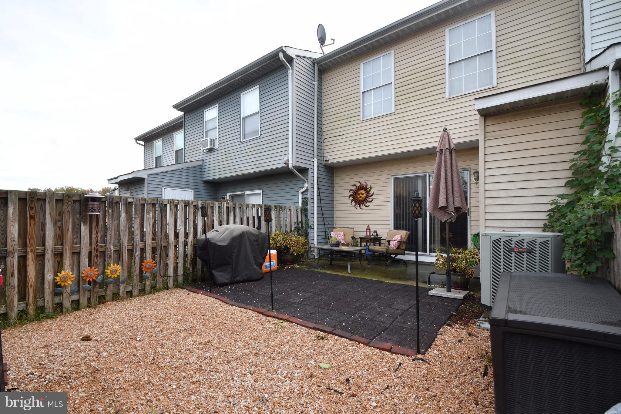 3924 Cutty Sark Road Baltimore, MD 21220 - Photo 25 of 30 a front view of a house with a porch