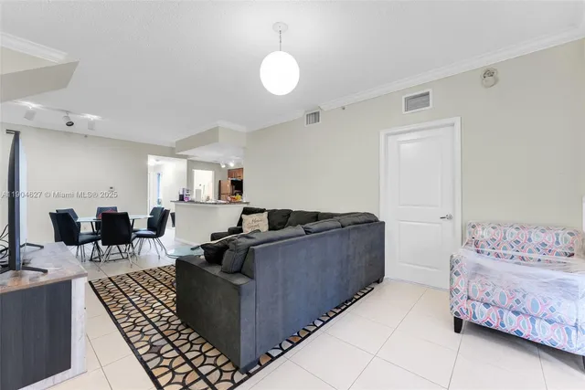 a living room with furniture and a couch