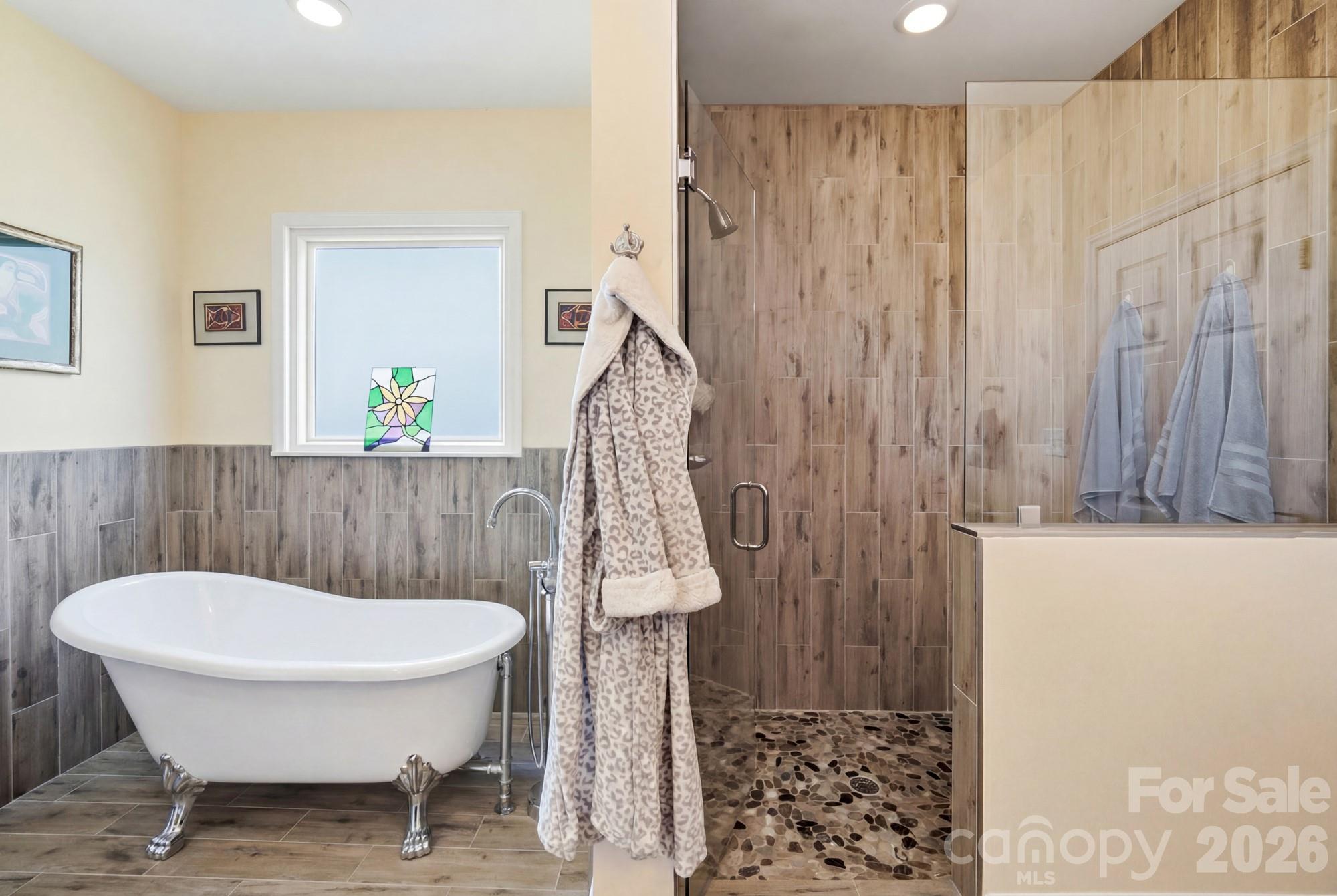 4415 Old Monroe Marshville Road Wingate, NC 28174 - Photo 13 of 28 a bathroom with a toilet a sink and a mirror