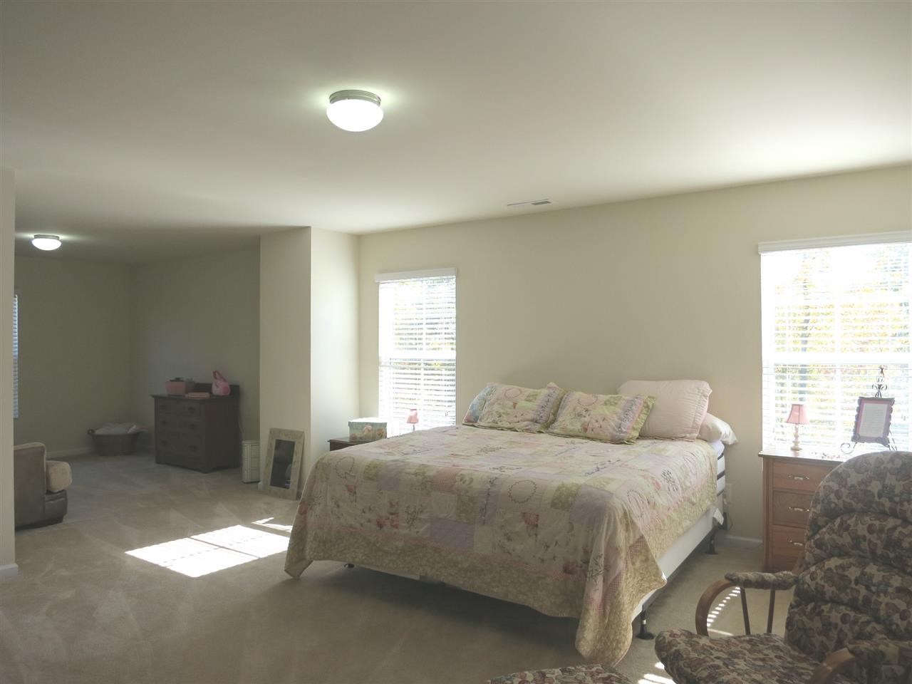 3808 Althorp Drive Raleigh, NC 27616 - Photo 15 of 25 The spacious Master Bedroom features neutral carpet, huge WIC, spacious Sitting Rm and lg private Bath.