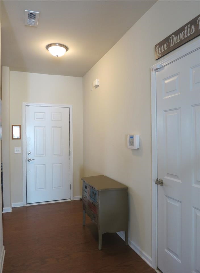 3808 Althorp Drive Raleigh, NC 27616 - Photo 24 of 25 The covered front Porch leads to the welcoming Foyer w/deep coat closet. There are beautiful dark hardwood flrs & 9' ceilings throughout the main level, and an open floor plan!