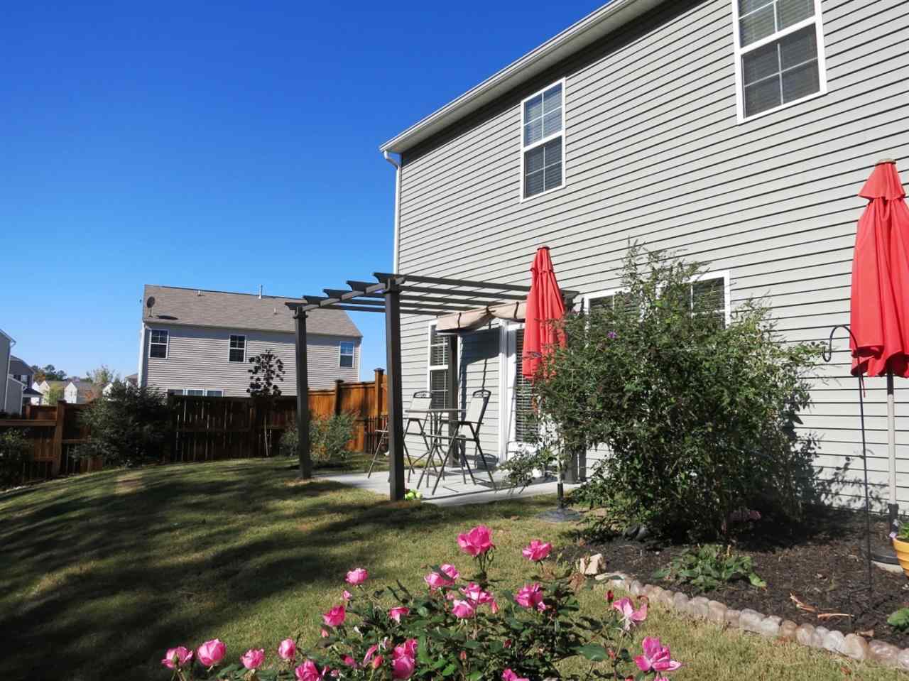 3808 Althorp Drive Raleigh, NC 27616 - Photo 22 of 25 Outside, there is a pergola-covered Patio off the Bfast area (great for grilling & entertaining!).